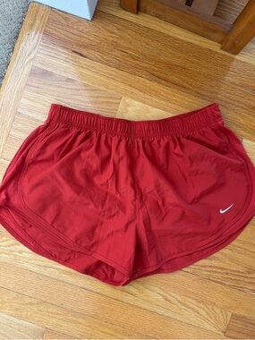Nike Women’s Dri-Fit Athletic Running Shorts -burnt red color